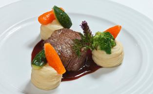 Beef filet with potato puree and vegetables